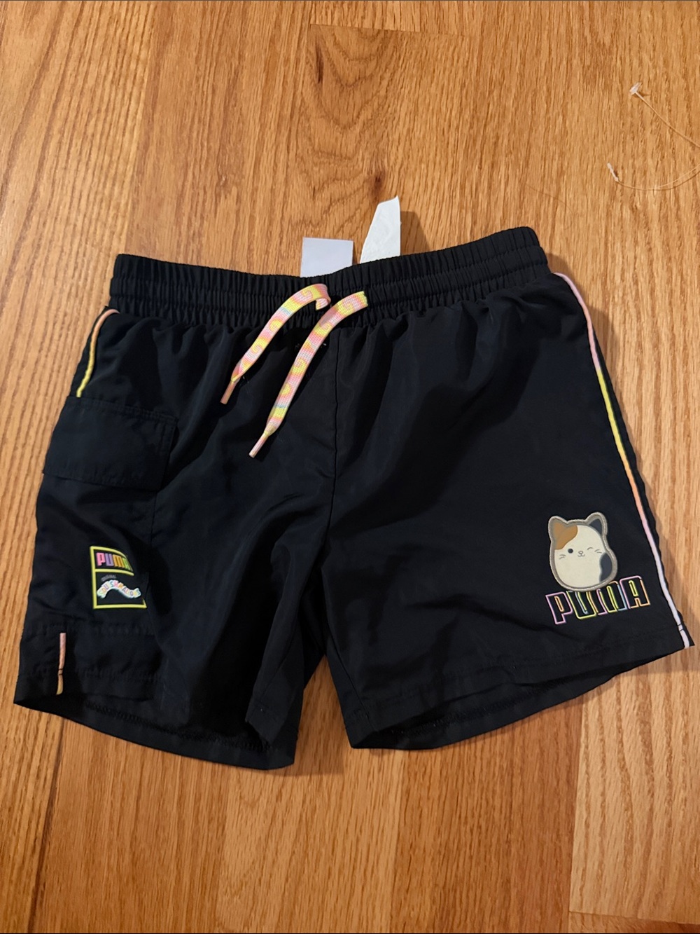 Puma Black Kids Shorts with Pastel Trim & Cat Graphic